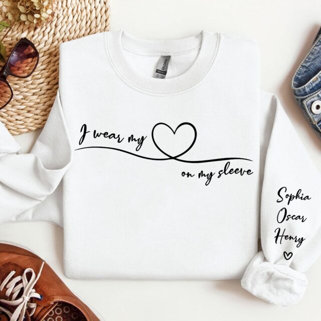 I Wear My Heart On My Sleeve Sweatshirt – Personalized Grandma Shirt with Grandkids’ Names