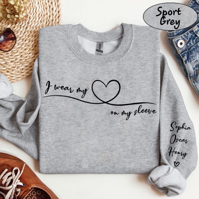 I Wear My Heart On My Sleeve Sweatshirt – Personalized Grandma Shirt with Grandkids’ Names