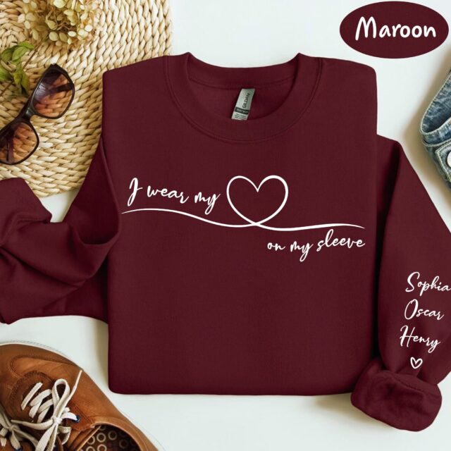 I Wear My Heart On My Sleeve Sweatshirt – Personalized Grandma Shirt with Grandkids’ Names